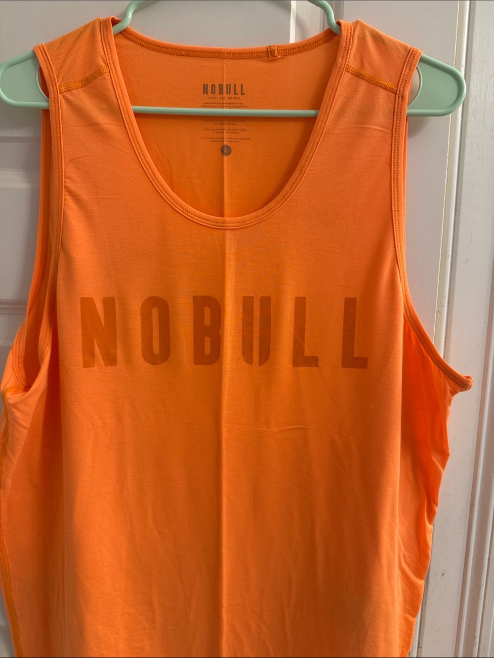 NOBULL Women's Bright Orange Training Tank with Front Logo